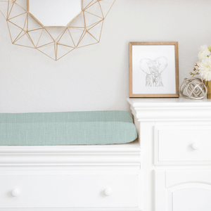 baby changing pad with cover in light blue